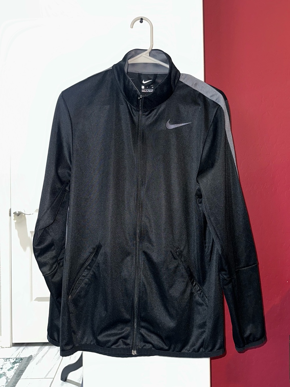 Nike Men’s Black Jacket with Gray Shoulder Stripe